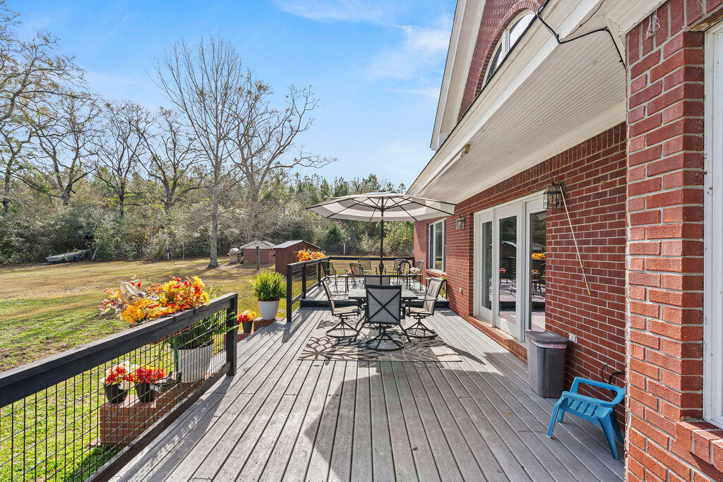 728 Otter Pond Road Westville, FL 32464 - Photo 28 of 39 a view of a chairs on the roof deck