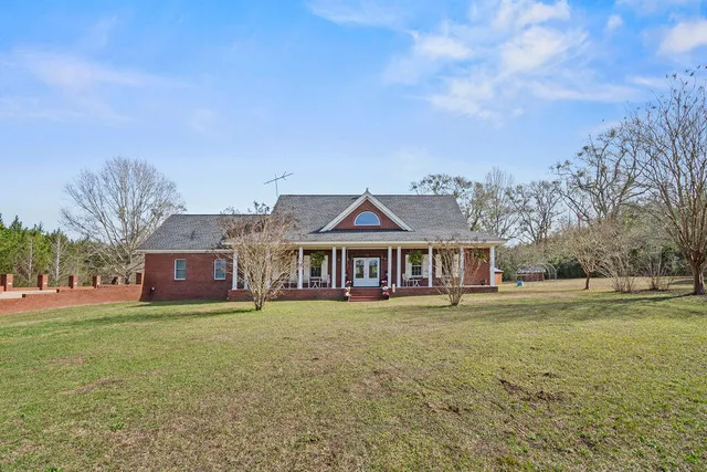 front view of a house with a yard