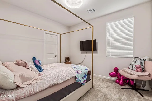 a workspace with furniture and a window