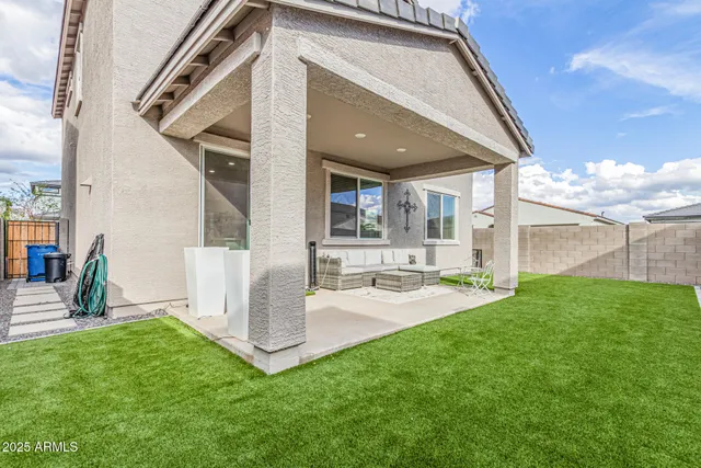 a view of workspace with wooden floor windows