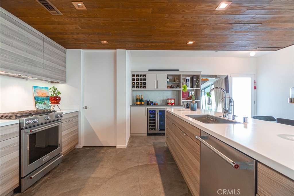 938 Palms Boulevard, Unit 2 Venice, CA 90291 - Photo 15 of 46 a kitchen with a sink and a stove top oven