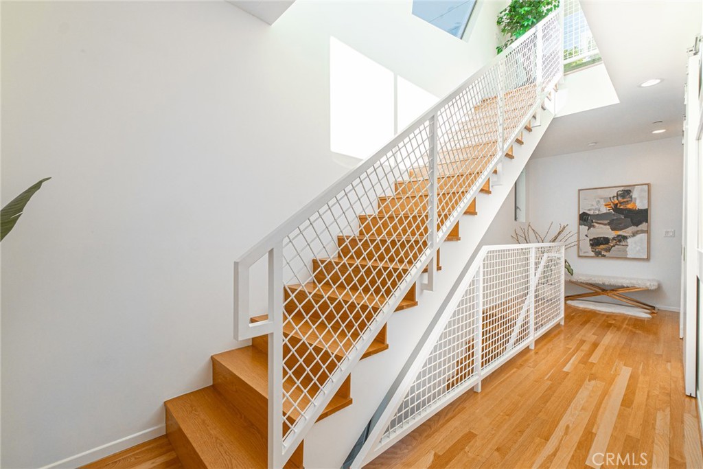 938 Palms Boulevard, Unit 2 Venice, CA 90291 - Photo 22 of 46 a view of entryway and hall with wooden floor