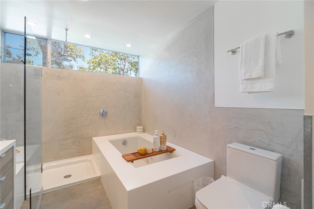 938 Palms Boulevard, Unit 2 Venice, CA 90291 - Photo 24 of 46 a bathroom with a sink a toilet and shower