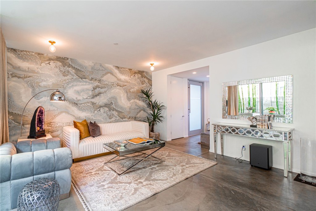 938 Palms Boulevard, Unit 2 Venice, CA 90291 - Photo 7 of 46 a living room with furniture and a fireplace