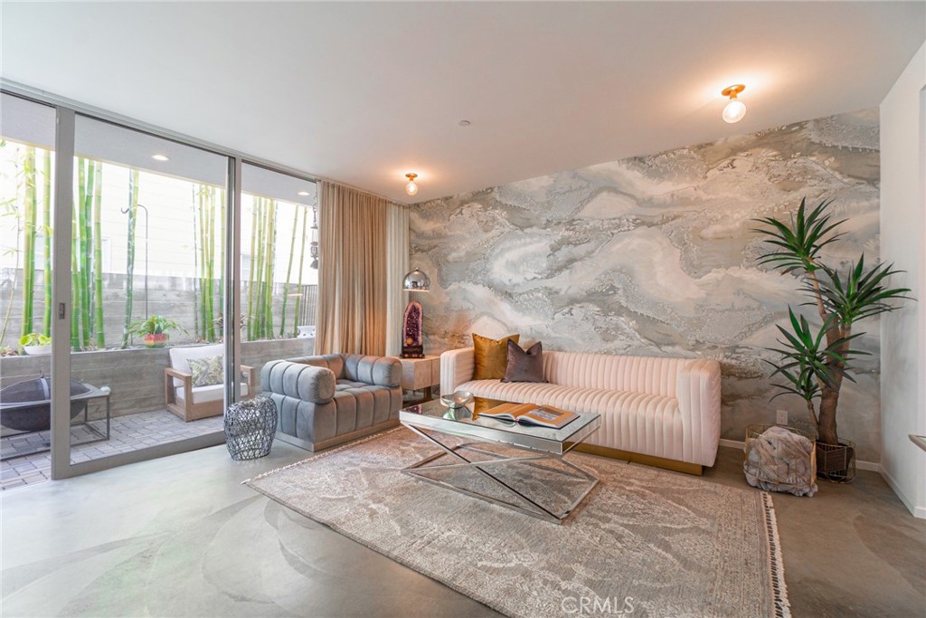 938 Palms Boulevard, Unit 2 Venice, CA 90291 - Photo 8 of 46 a living room with furniture and a large window