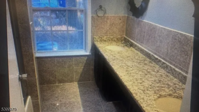 a bathroom with a bathtub