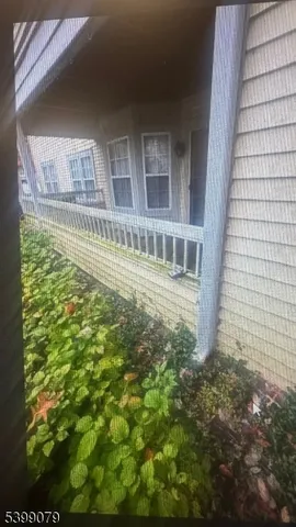 a view of a large building with a yard