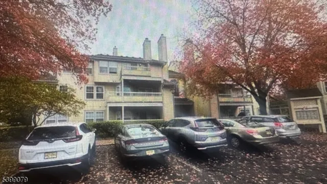 a view of a patio with couches and fire pit