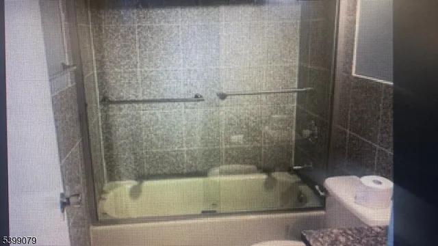a close view of a bathtub in bathroom
