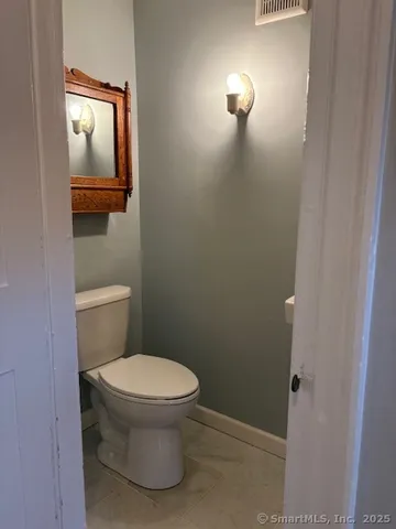 a bathroom with a toilet