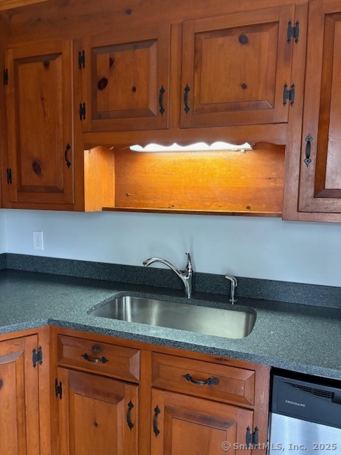 20 Riverview Road Rocky Hill, CT 06067 - Photo 33 of 35 a kitchen with a sink and cabinets