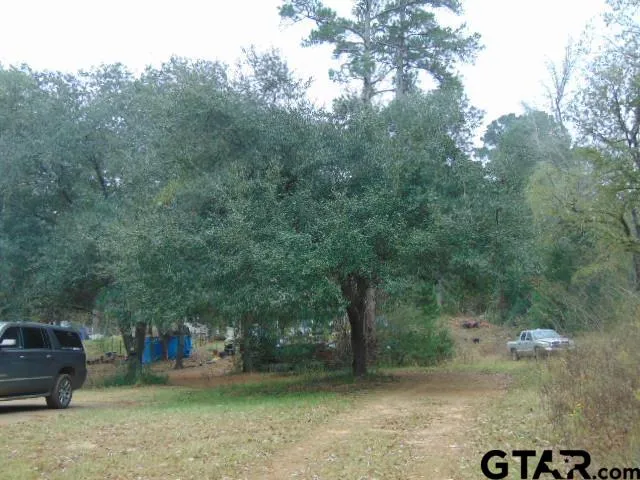 a room with gym equipment and a window
