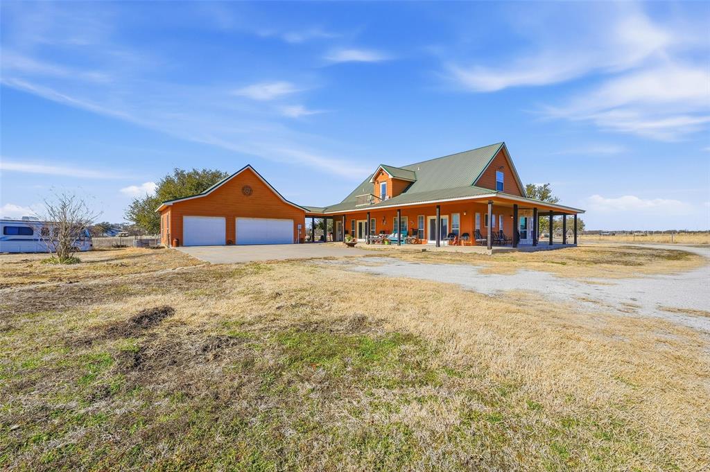 346 Forreston Road Waxahachie, TX 75165 - Photo 2 of 36 a house with swimming pool in front of it