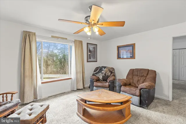 a room with furniture and a window