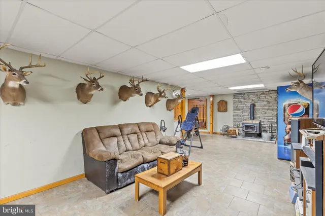 a living room with furniture a couch and a table