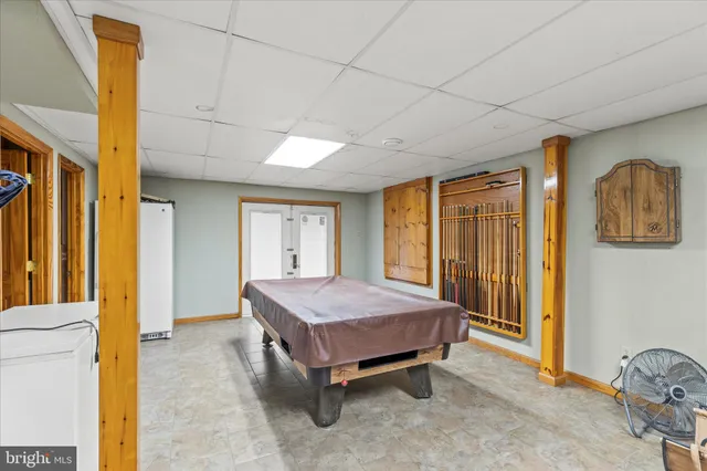 a spacious bedroom with a bed and a table