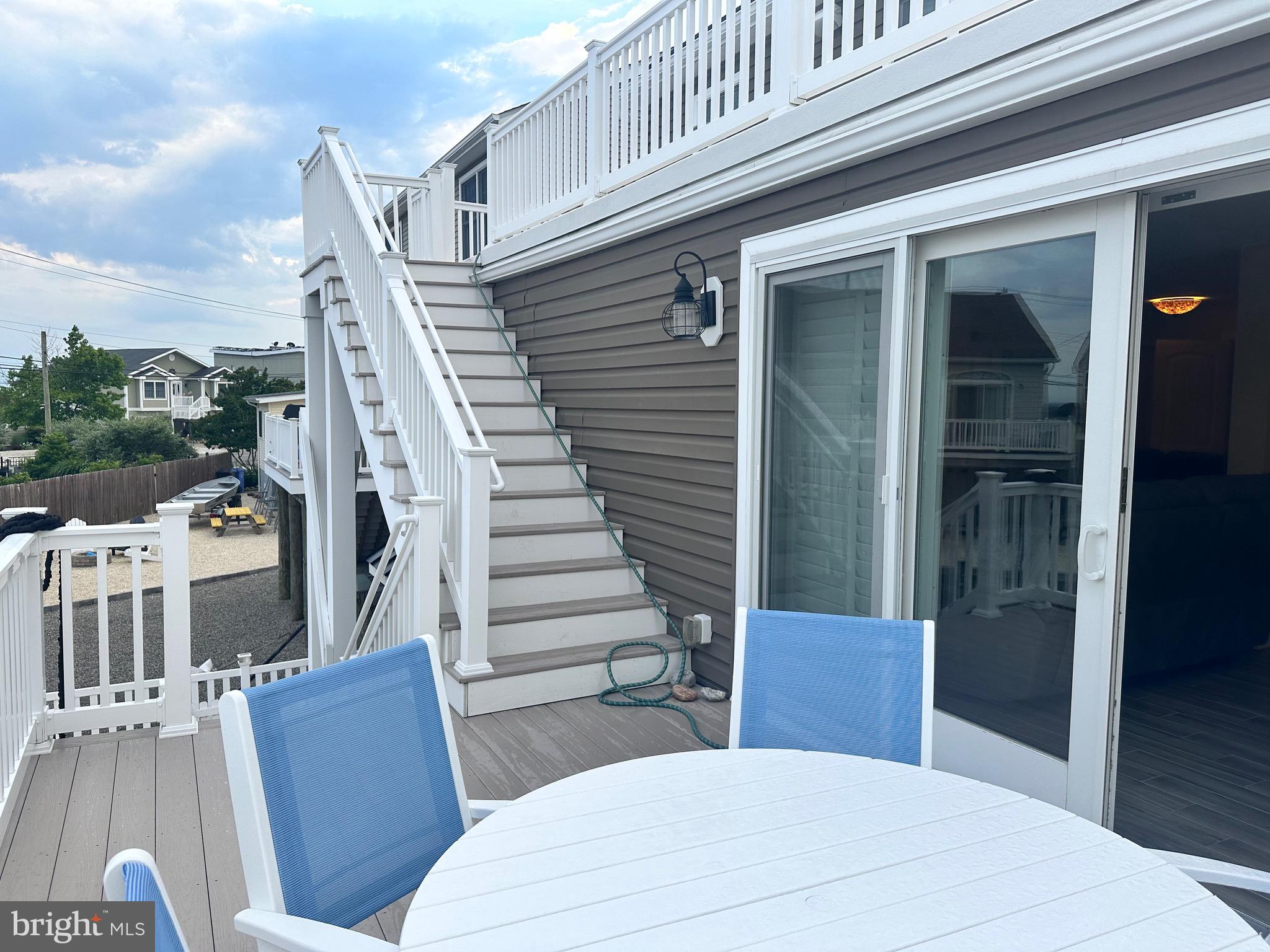 19 Ruth Ann Drive Manahawkin, NJ 08050 - Photo 19 of 55 1st level deck and steps to upper deck
