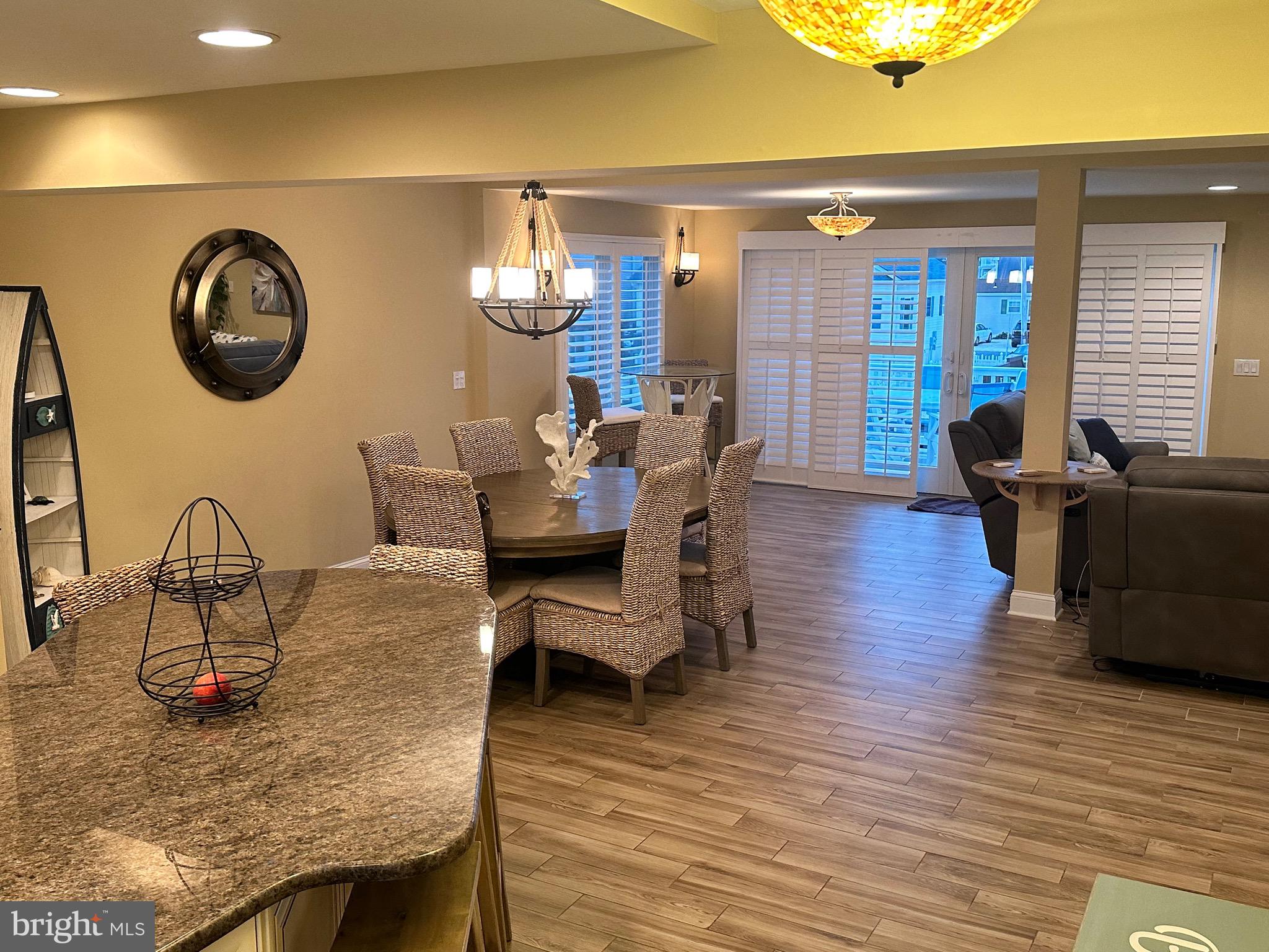 19 Ruth Ann Drive Manahawkin, NJ 08050 - Photo 8 of 55 Dining Room & Family Room w/sliding doors onto