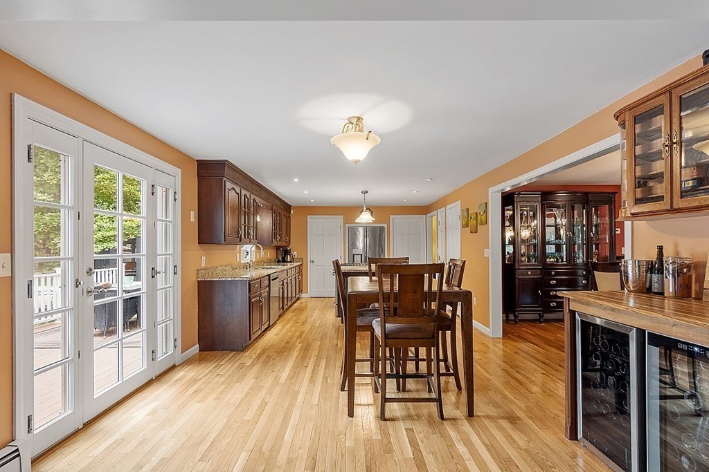 237 Hollis Road Lunenburg, MA 01462 - Photo 12 of 42 a view of a dining room with furniture window and wooden floor