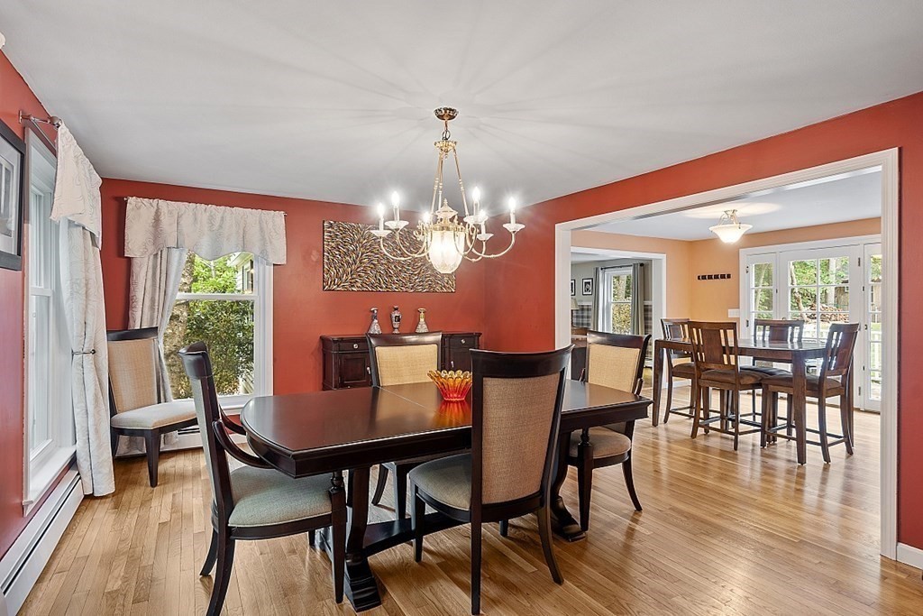 237 Hollis Road Lunenburg, MA 01462 - Photo 13 of 42 a view of a dining room with furniture window and wooden floor