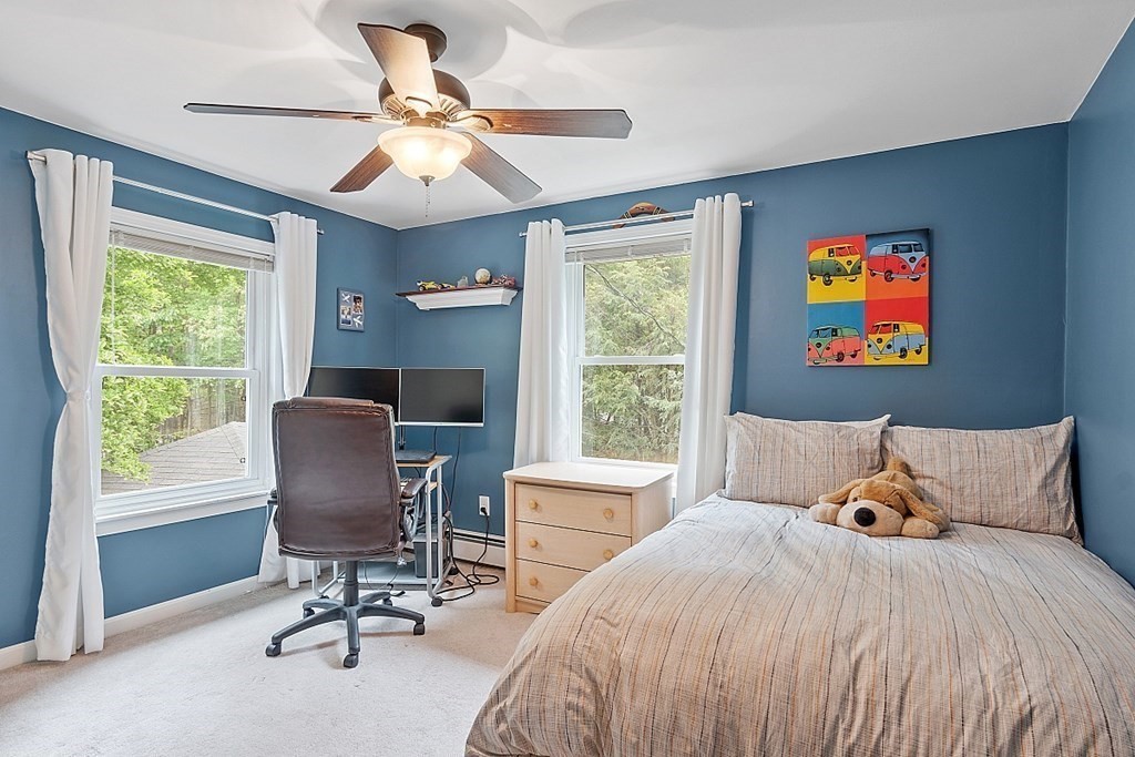 237 Hollis Road Lunenburg, MA 01462 - Photo 23 of 42 a bedroom with a bed and a window