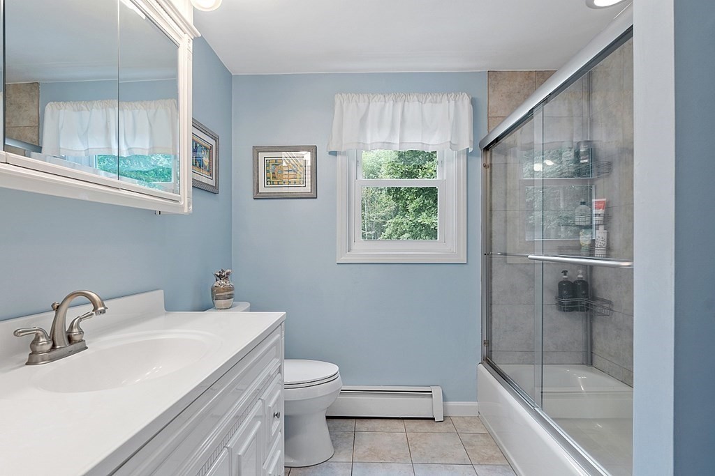 237 Hollis Road Lunenburg, MA 01462 - Photo 25 of 42 a bathroom with a sink toilet and shower