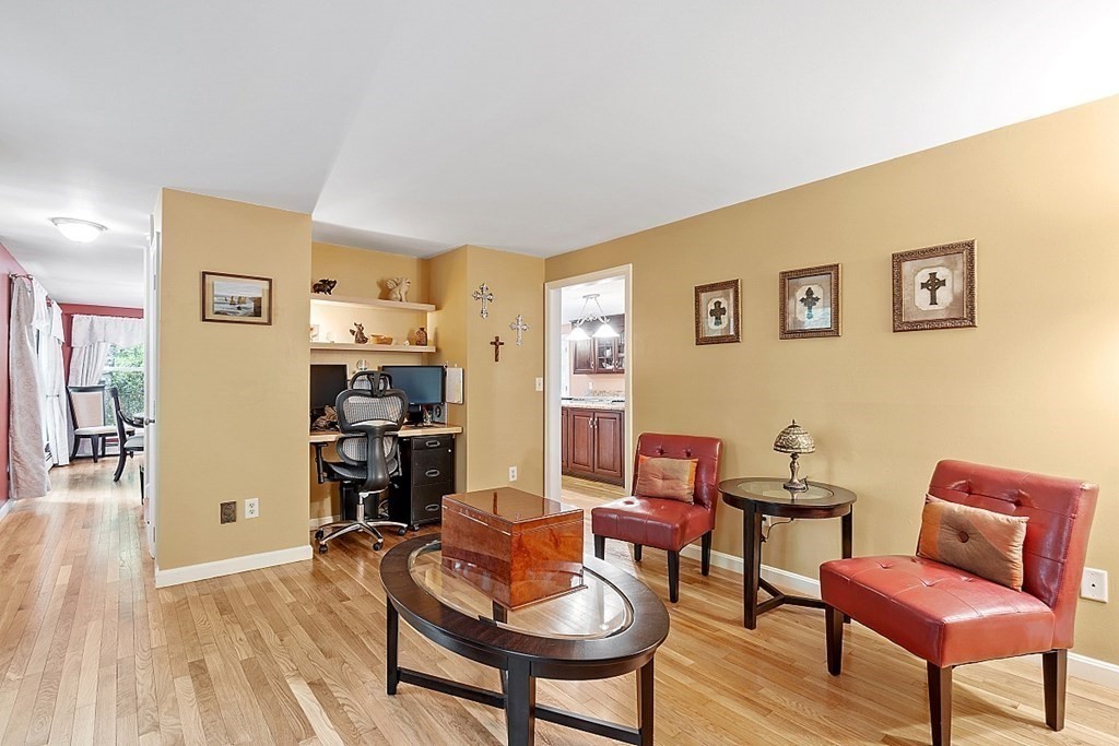 237 Hollis Road Lunenburg, MA 01462 - Photo 5 of 42 a living room with furniture and a wooden floor