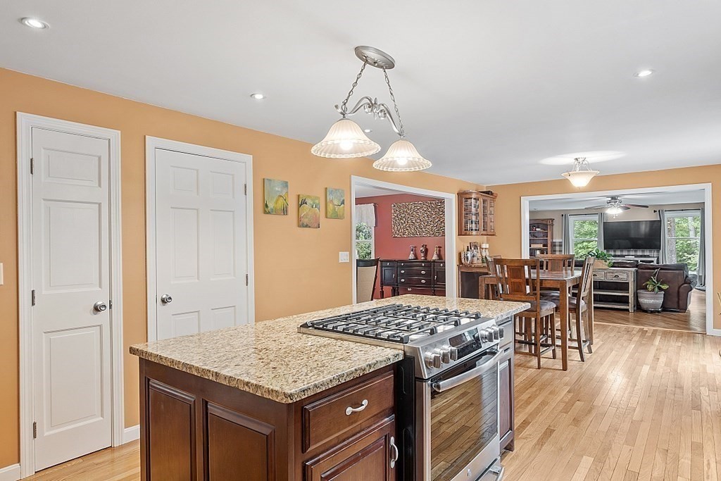237 Hollis Road Lunenburg, MA 01462 - Photo 9 of 42 a kitchen with a stove and cabinets
