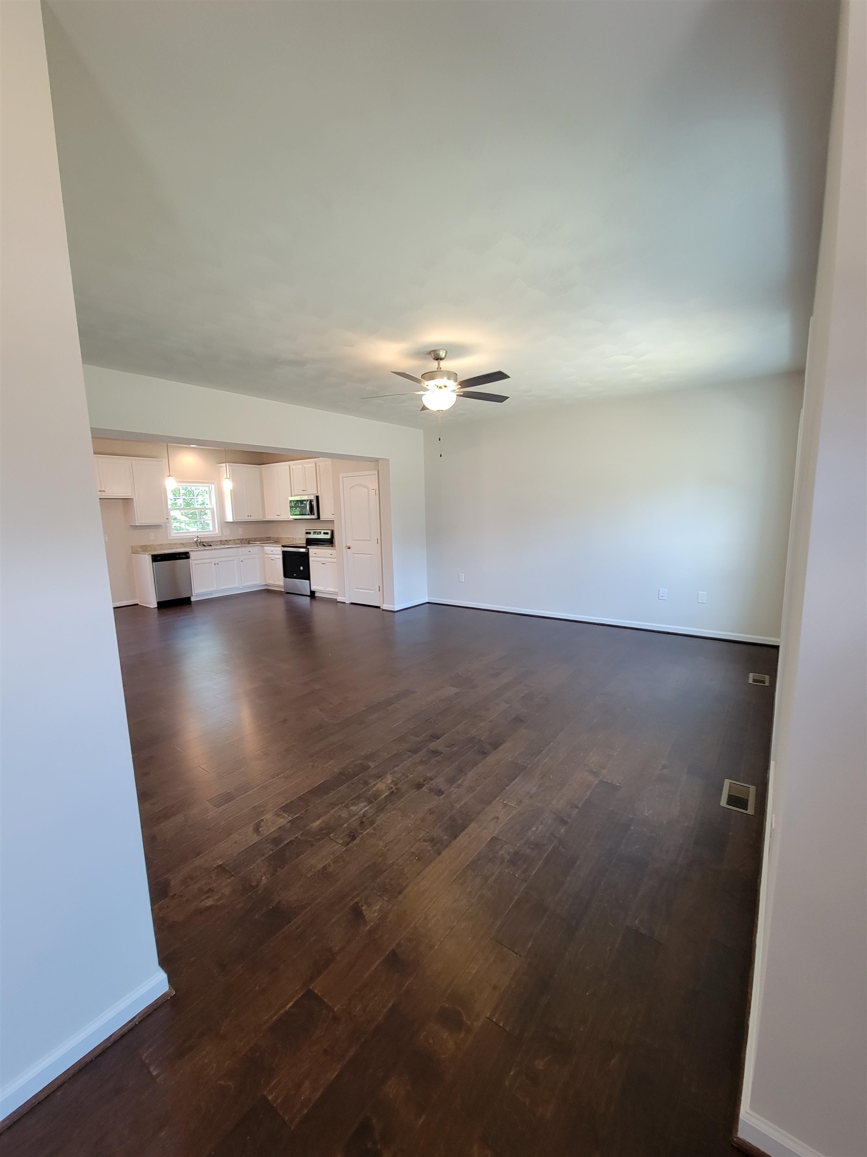 912 New Hope Road Staunton, VA 24401 - Photo 3 of 8 a view of empty room with wooden floor