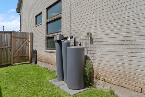 an aerial view of houses with outdoor space