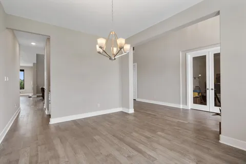 a view of a livingroom with wooden floor