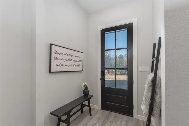 a view of livingroom with furniture and wooden floor