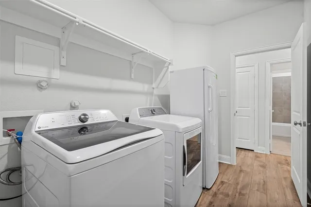 a utility room with dryer and washer