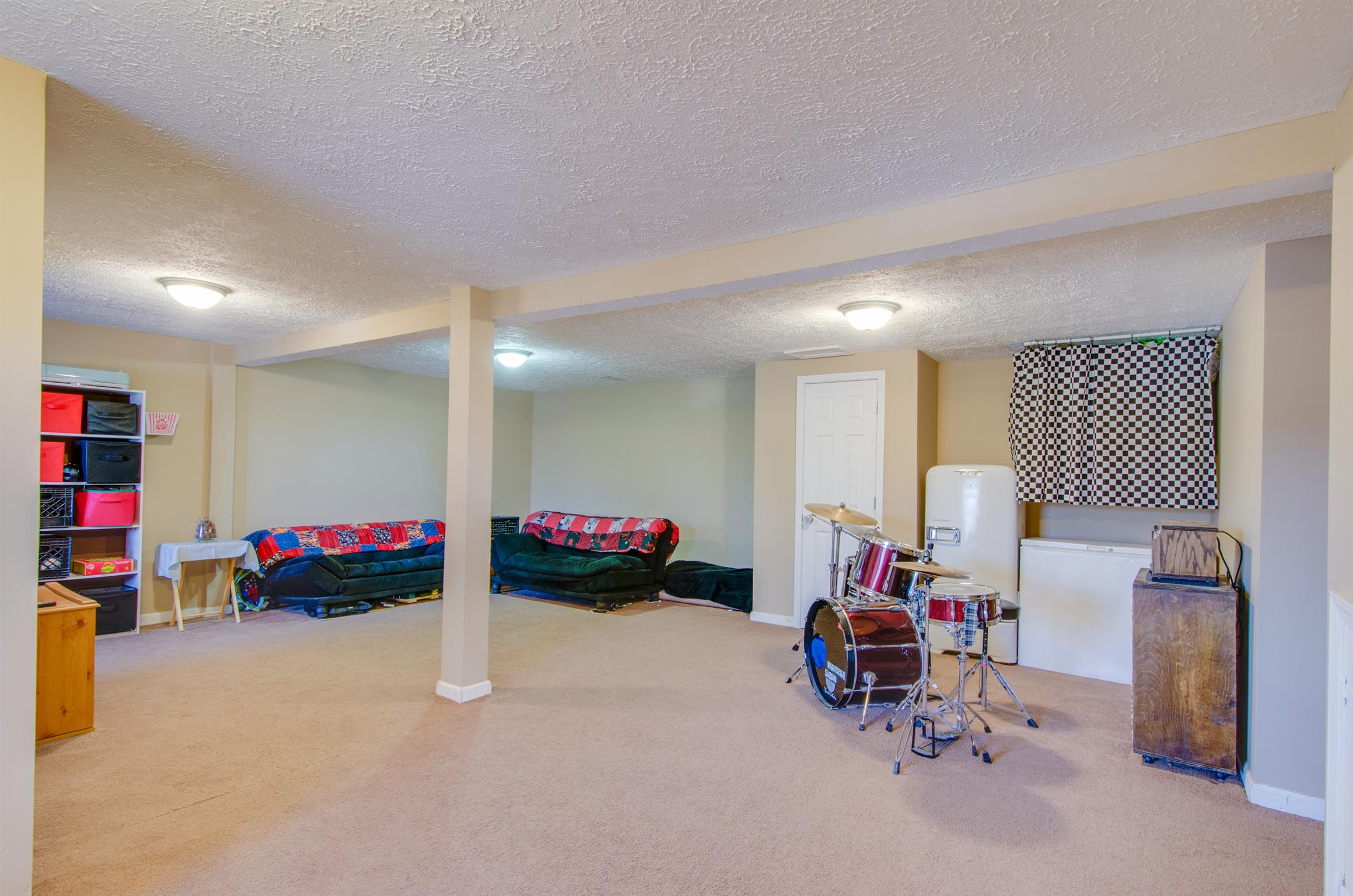 1133 Jacksons View Road Hermitage, TN 37076 - Photo 14 of 20 a living room with furniture and a couch