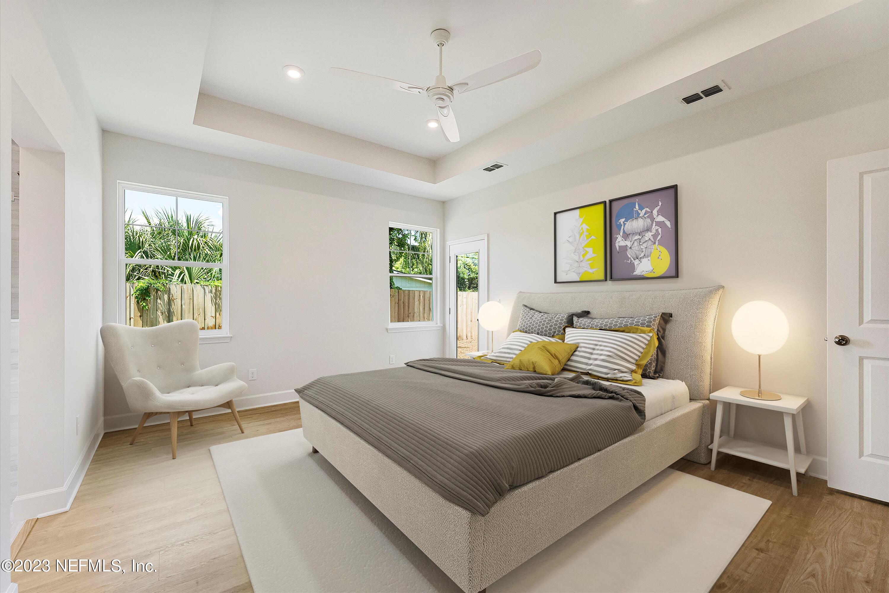 330 Sargo Road Atlantic Beach, FL 32233 - Photo 20 of 41 a bedroom with a bed and a couch
