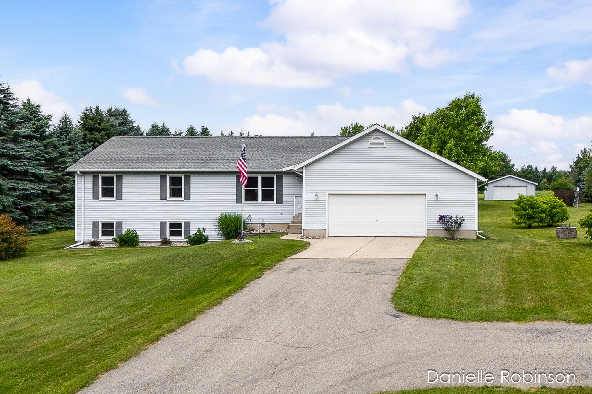 6829 12 Mile Road Northeast Rockford, MI 49341 - Photo 2 of 70 02-WM682912mile-1