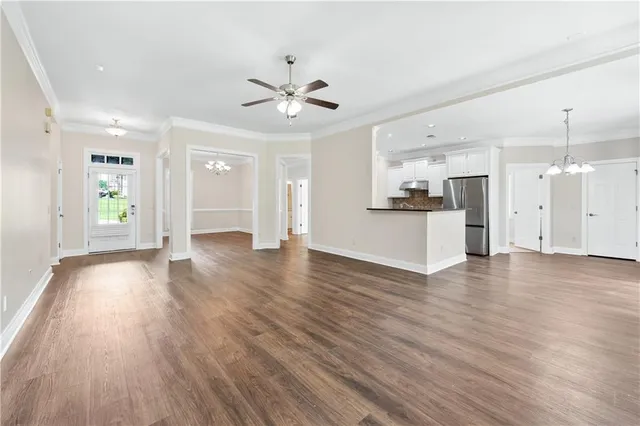 a view of a kitchen with a sink and a window