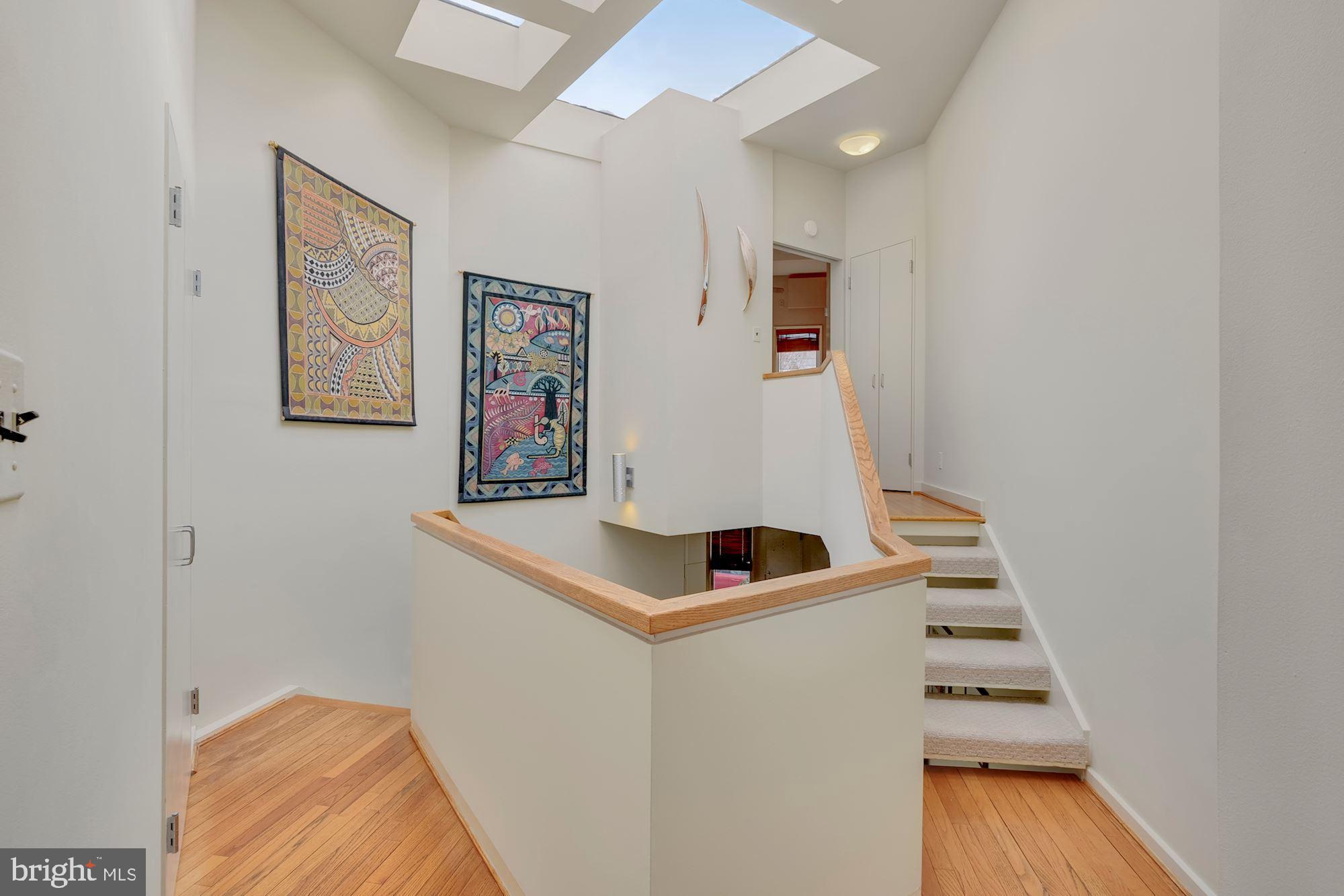 2415 I Street Northwest Washington, DC 20037 - Photo 14 of 28 Dramatic stairways & skylights