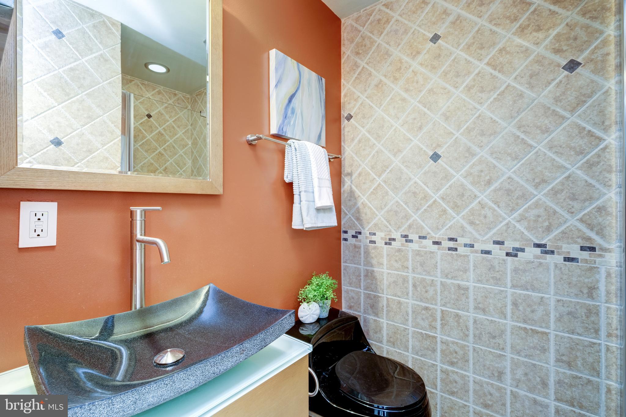 2415 I Street Northwest Washington, DC 20037 - Photo 18 of 28 Ensuite bath with walk-in shower