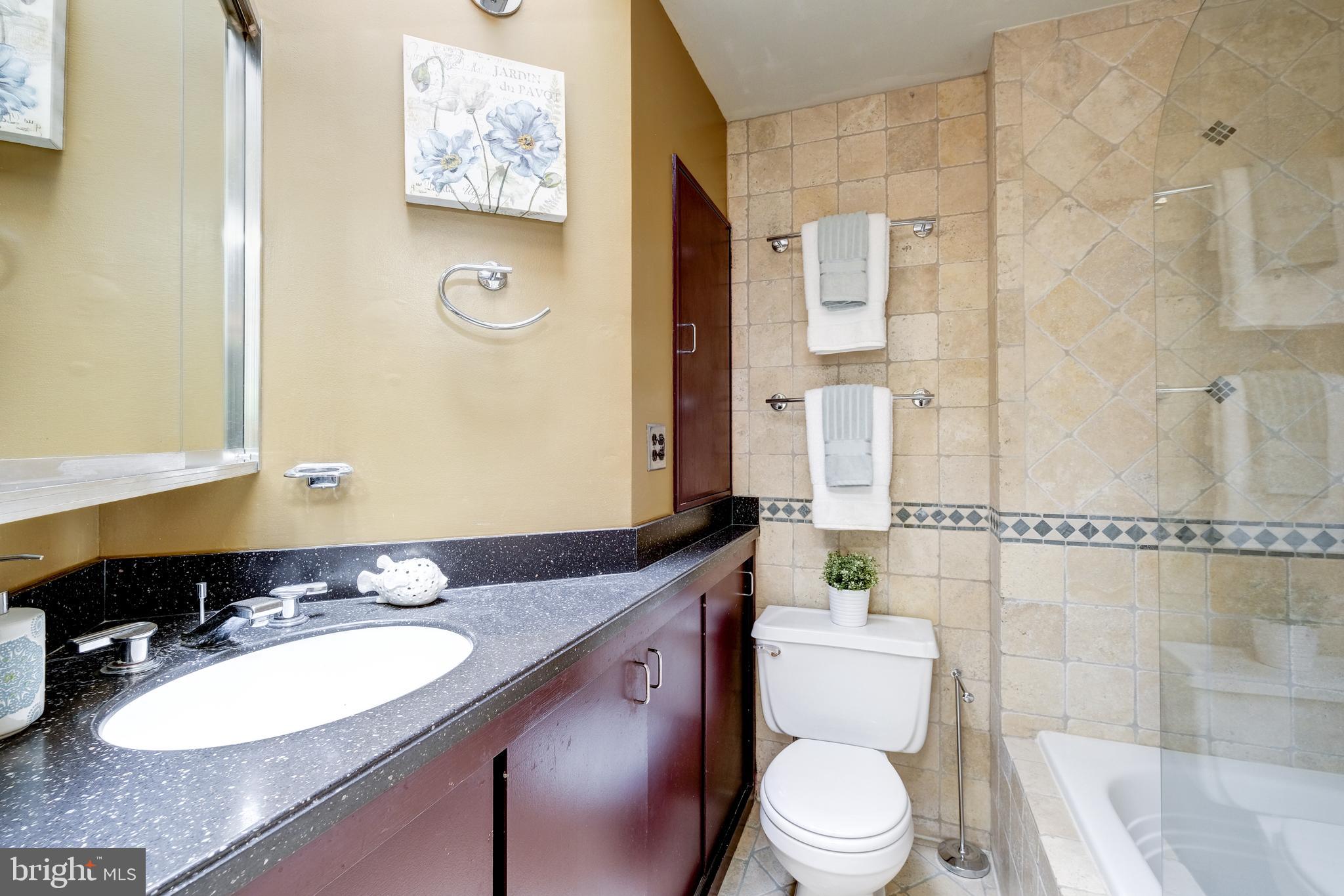 2415 I Street Northwest Washington, DC 20037 - Photo 21 of 28 Ensuite bath w/tub and shower