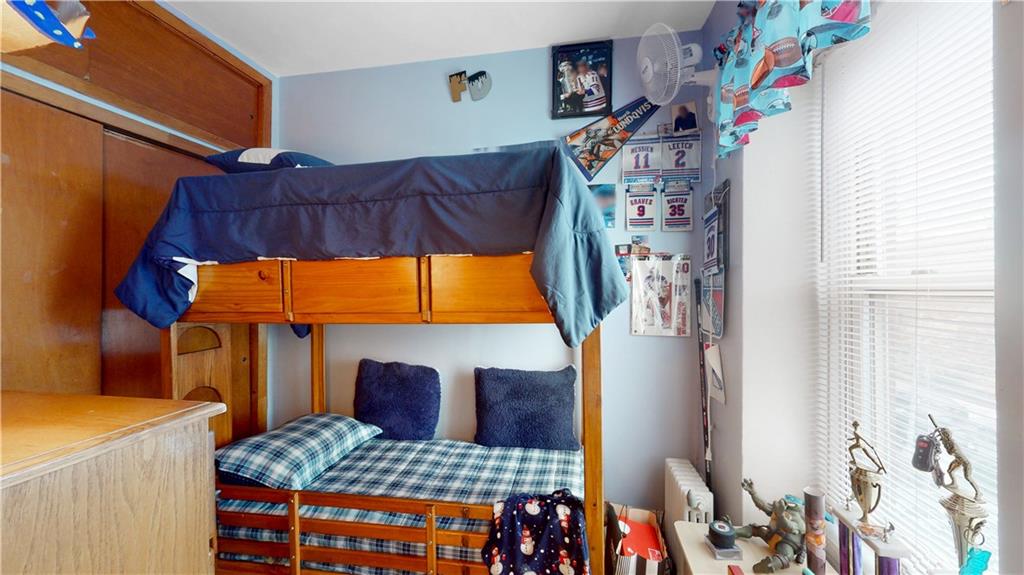 29 3rd Place Brooklyn, NY 11231 - Photo 12 of 25 a living room with a couch and dresser