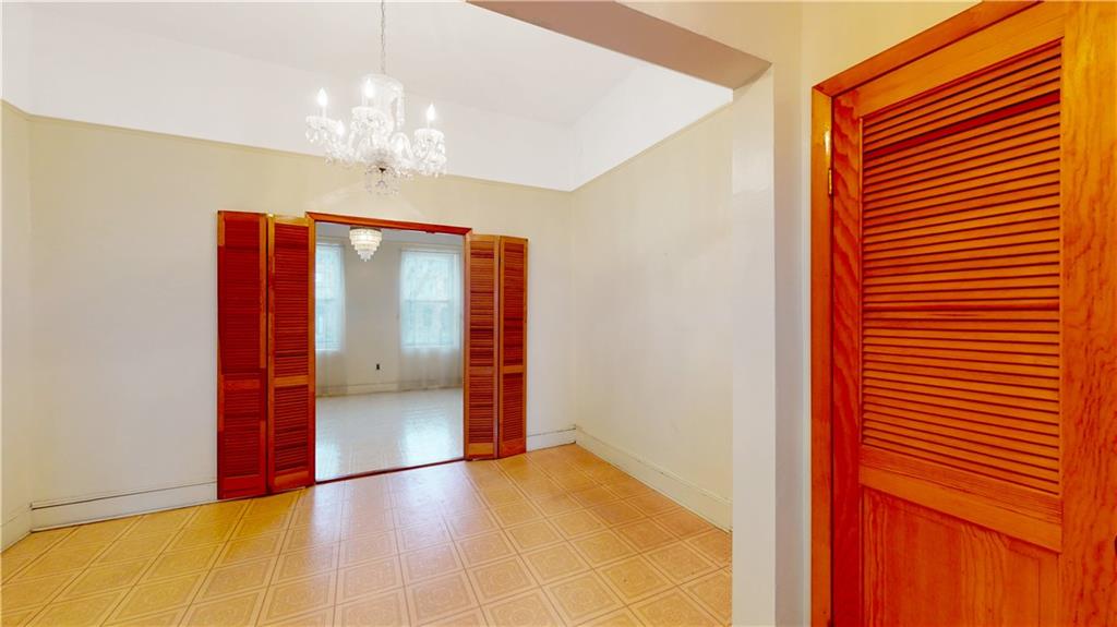 29 3rd Place Brooklyn, NY 11231 - Photo 17 of 25 a view of a hallway with a chandelier