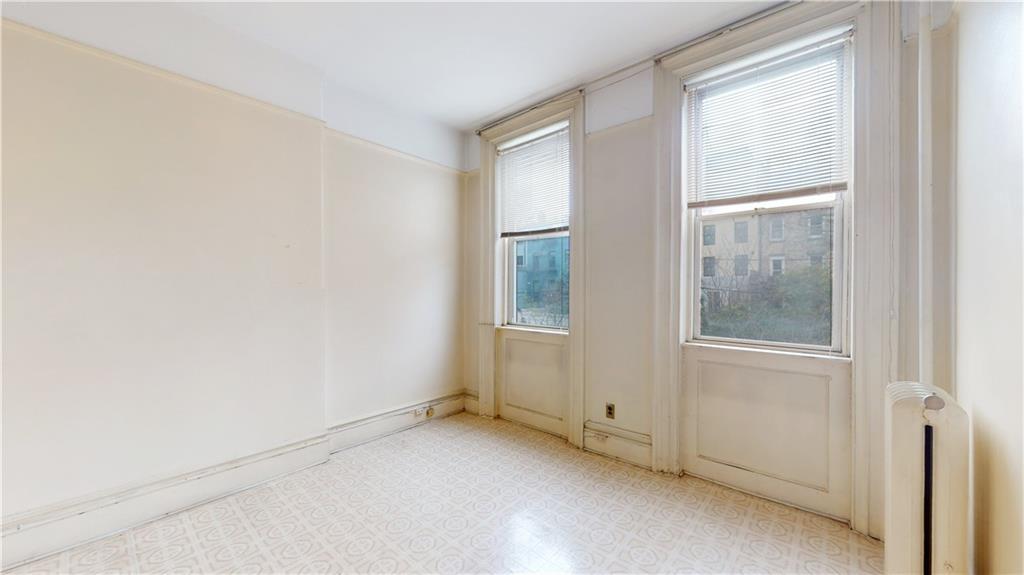 29 3rd Place Brooklyn, NY 11231 - Photo 18 of 25 an empty room with windows