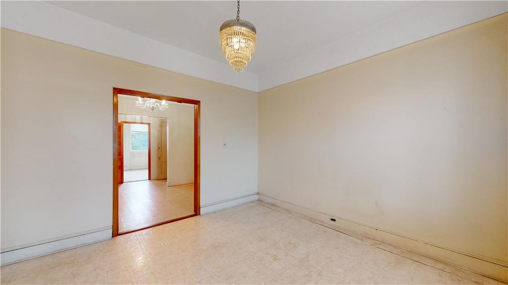 29 3rd Place Brooklyn, NY 11231 - Photo 21 of 25 an empty room with wooden floor and windows