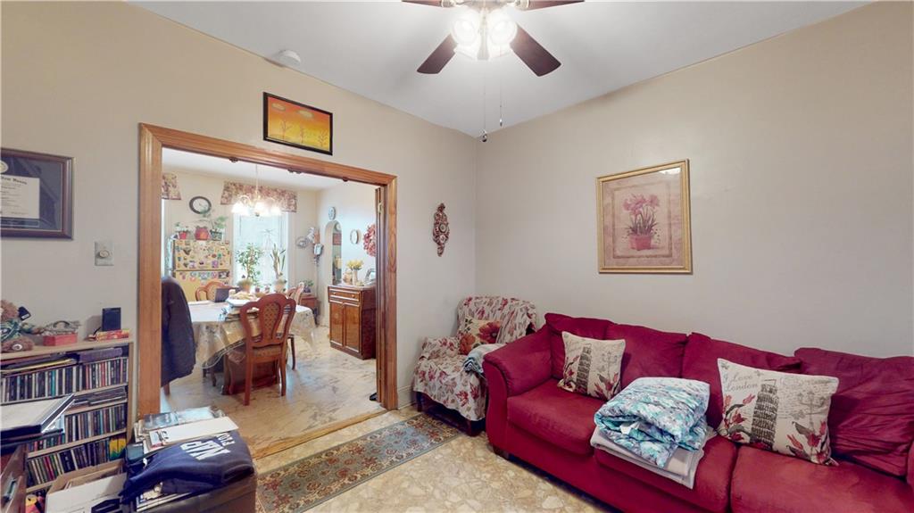 29 3rd Place Brooklyn, NY 11231 - Photo 8 of 25 a living room with furniture and a window