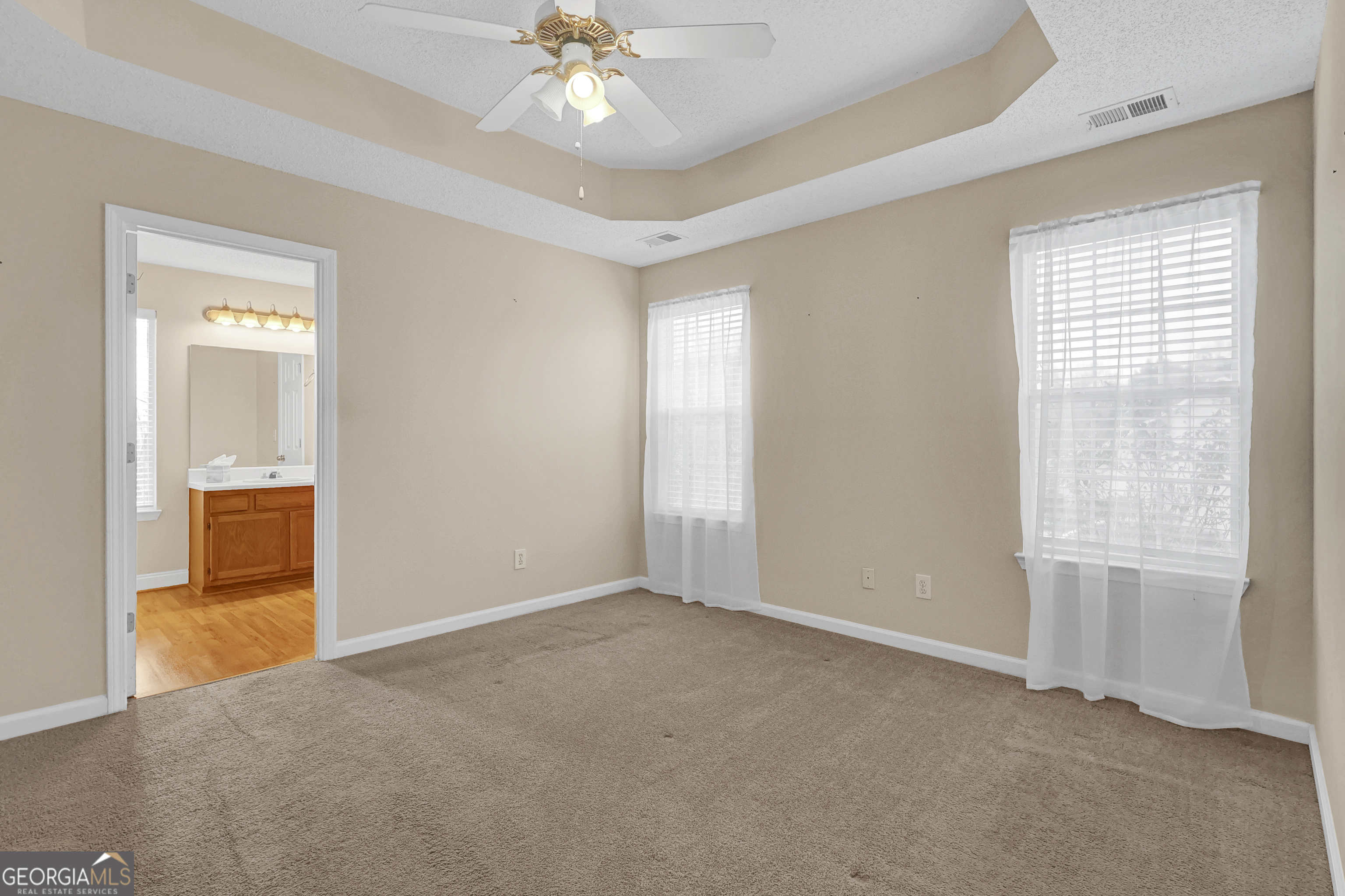 313 Harris Avenue Locust Grove, GA 30248 - Photo 15 of 34 a view of an empty room with a window