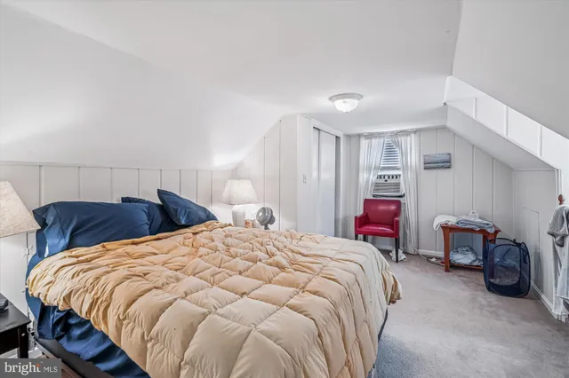 a bathroom with a toilet and a sink