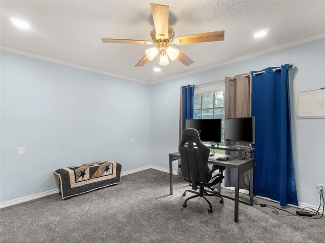 a room with furniture and chandelier