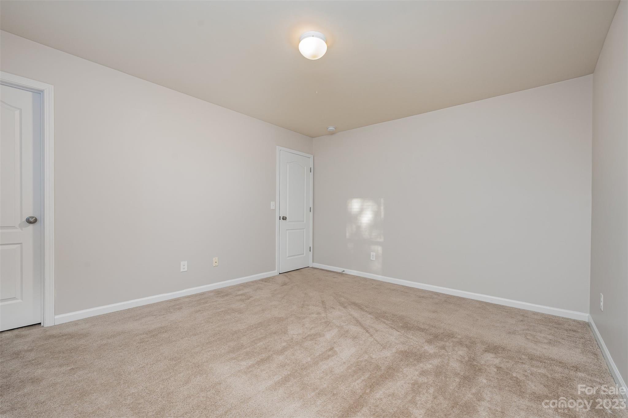 13225 Chelsea Ridge Lane Huntersville, NC 28078 - Photo 22 of 40 a view of an empty room
