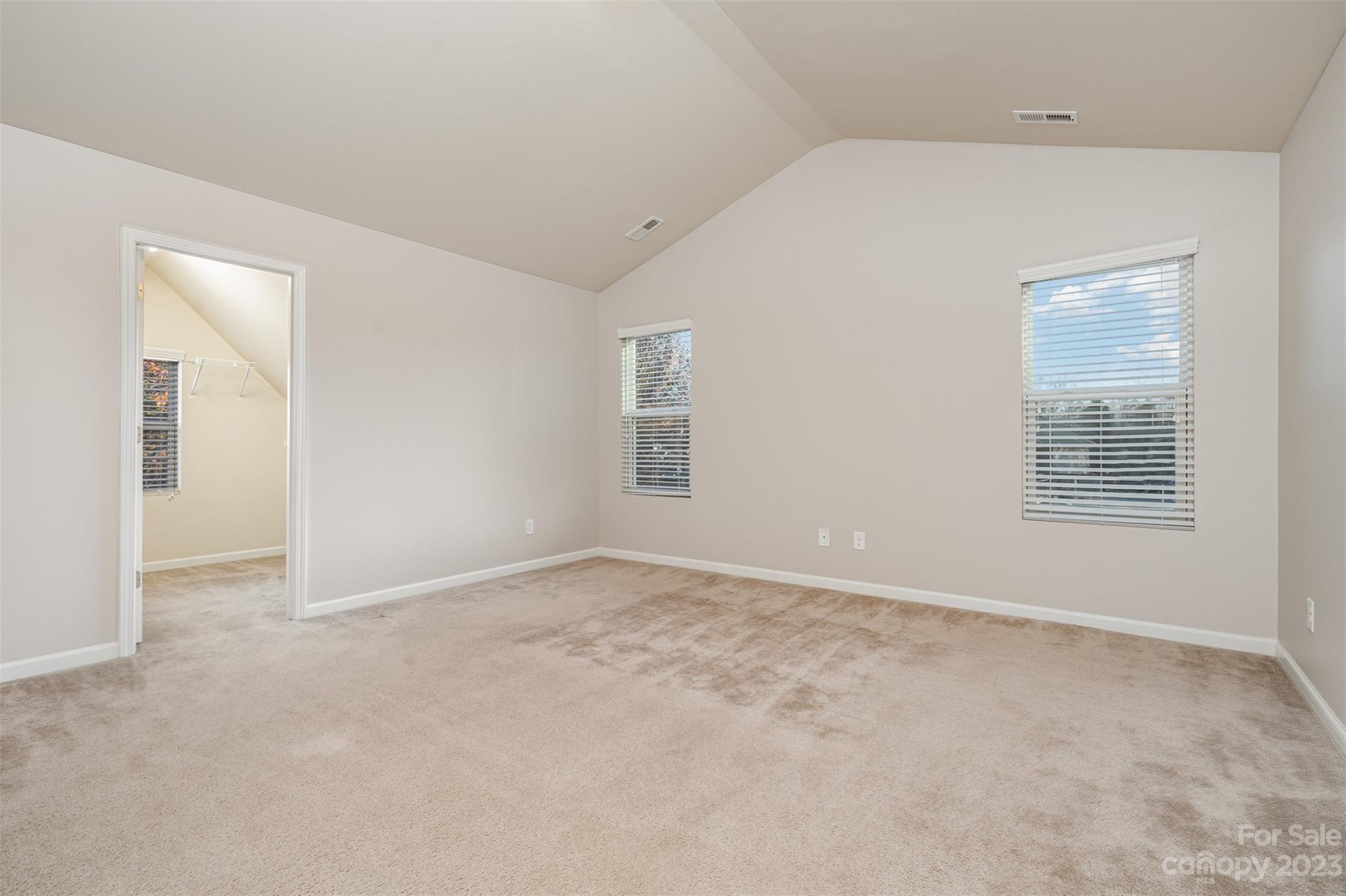 13225 Chelsea Ridge Lane Huntersville, NC 28078 - Photo 23 of 40 an empty room with windows